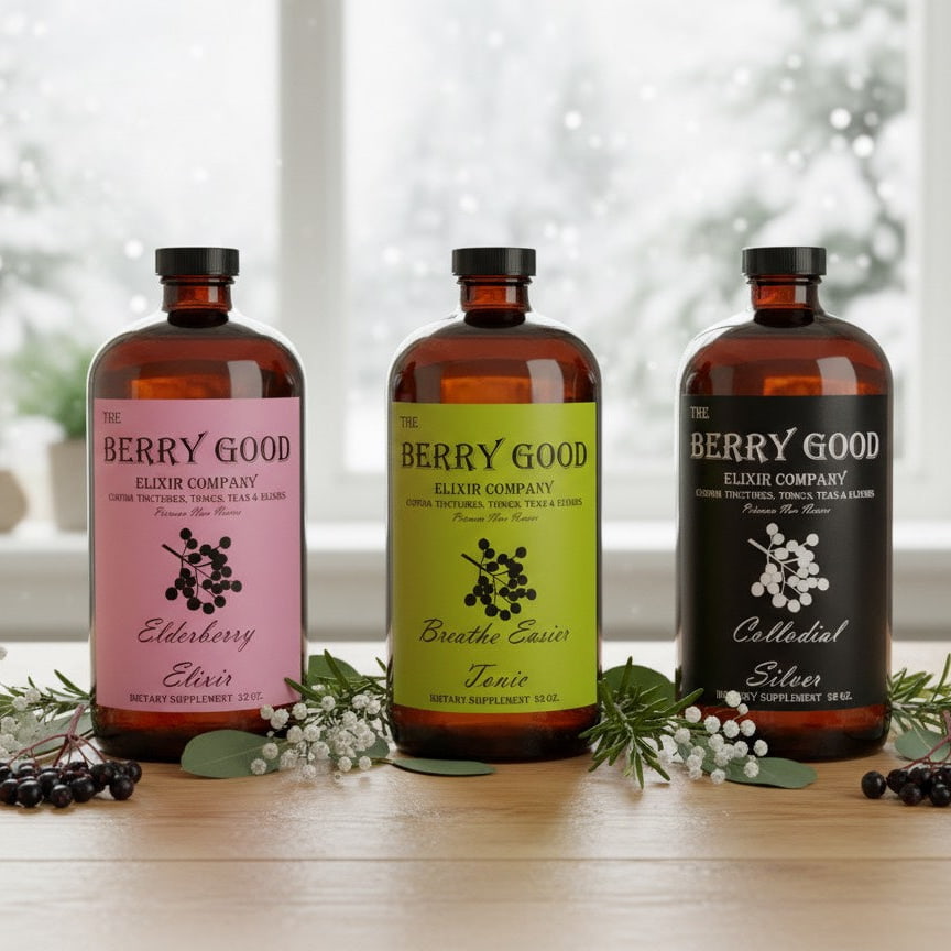 Picture with Elderberry Elixir, Breathe easier Tonic and Colloidal Silver on a countertop in front of a window with snow outside. 