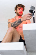 Load image into Gallery viewer, Glow: Portable Red Light Therapy Device - Slimmest Handheld Solution for On-the-Go Relief